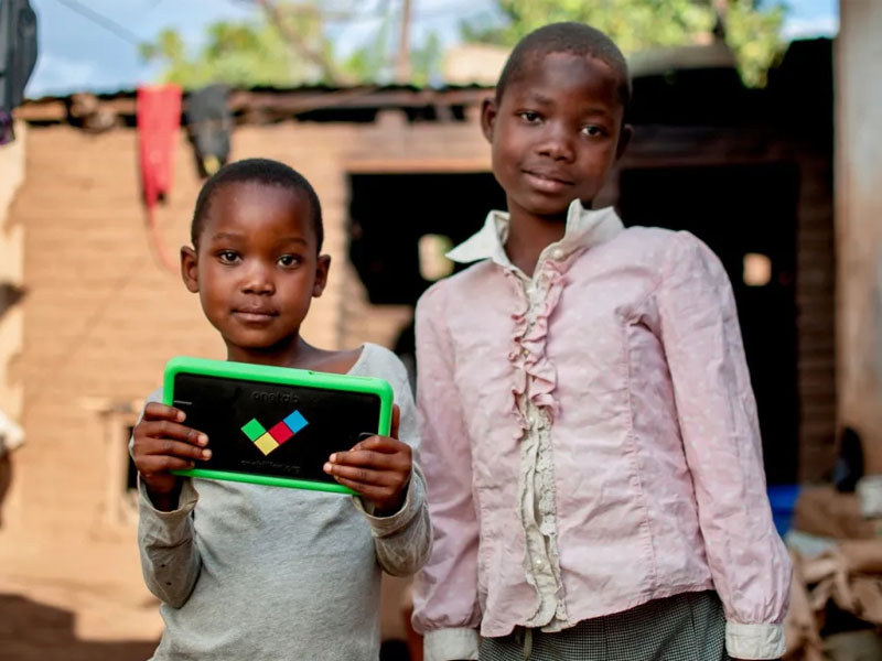 Students using technology in a classroom
